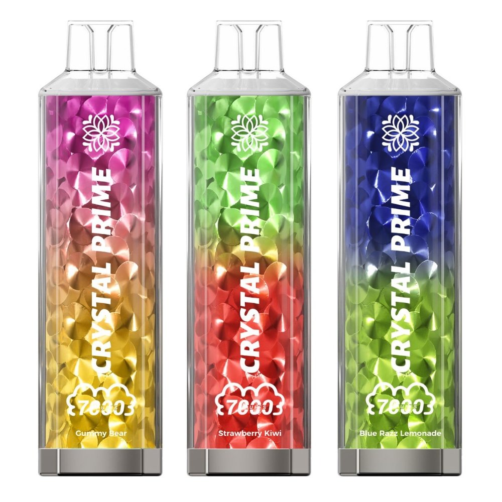 Three vibrant Crystal Prime 7000 disposable vapes (Gummy Bear, Strawberry Kiwi, Blue Razz Lemonade), highlighting the crystal design and flavour variety.